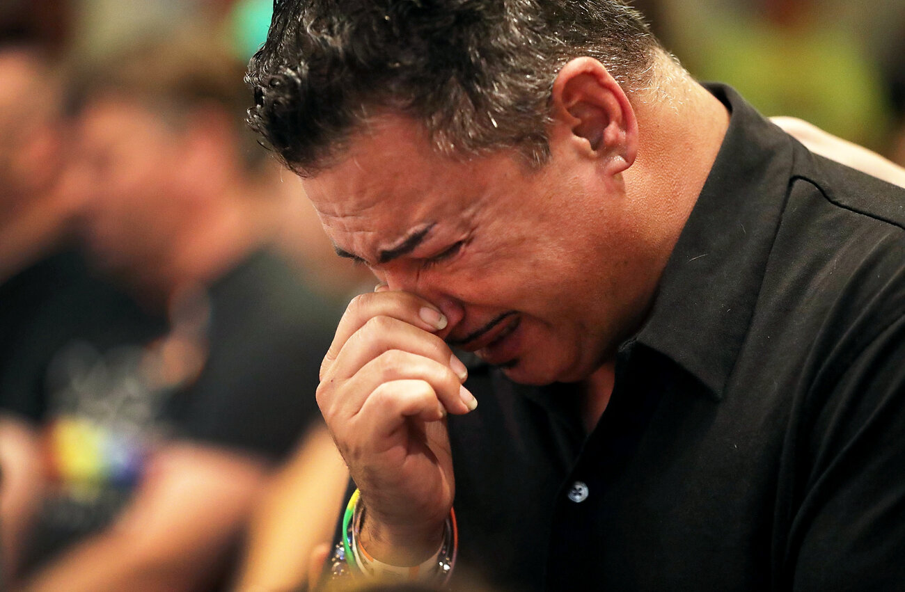 Orlando (who did not want to provide his last name), who was injured in the mass shooting at the Pulse Nightclub, cries as he attends a memorial service at the Joy MCC Church for the victims of the mass shooting. Orlando (who did not want to provide his last name), who was injured in the mass shooting at the Pulse Nightclub, cries as he attends a memorial service at the Joy MCC Church for the victims of the mass shooting.