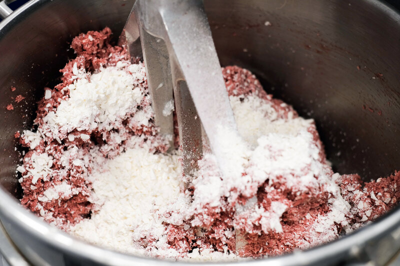 To mimic beef fat, Impossible Foods' meat-free burger uses flecks of coconut oil that are solid at room temperature and melt when cooked. To mimic beef fat, Impossible Foods' meat-free burger uses flecks of coconut oil that are solid at room temperature and melt when cooked.