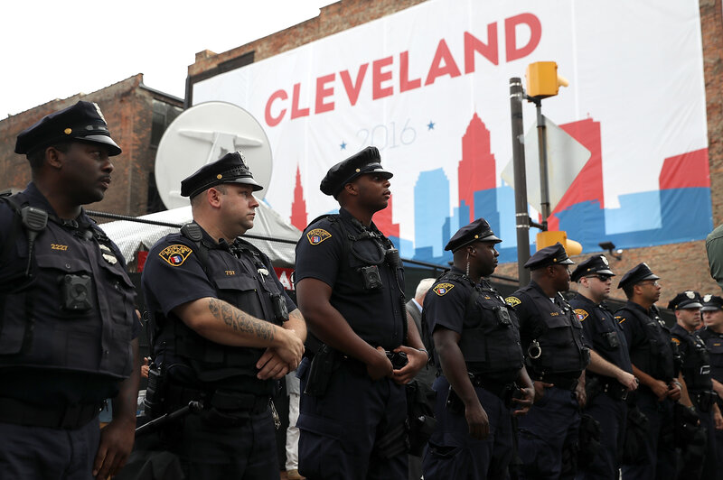 Cleveland police officers stand guard outside the site of the Republican National Convention. Cleveland police officers stand guard outside the site of the Republican National Convention.