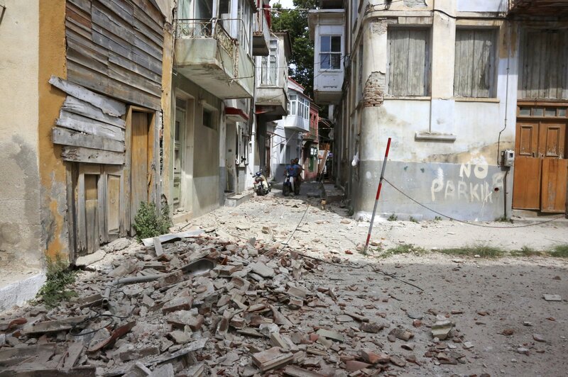Debris from a damaged building after an earthquake in the village of Plomari on the northeastern Greek island of Lesbos on Monday. Manolis Lagoutaris/AP