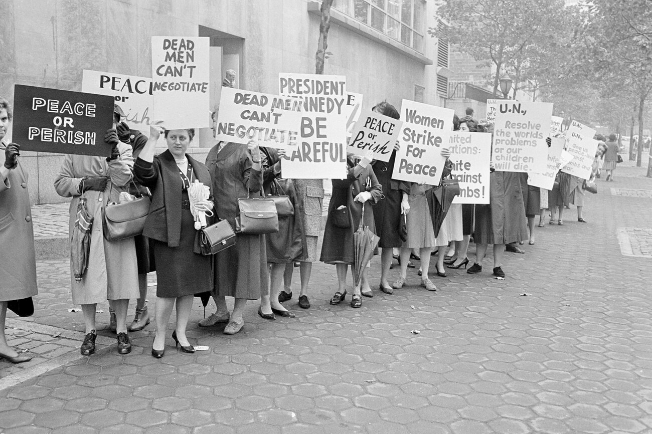 Pickets representing an organization known as Women Strike for Peace carry placards outside the United Nations headquarters in New York City, where the U.N. Security Council considers the Cuban Missile Crisis in a special meeting on Oct. 23, 1962.
AP