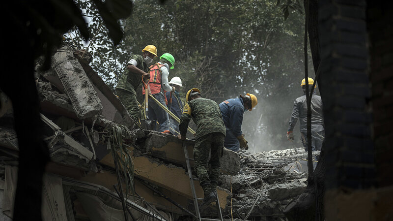  Rescue workers search for earthquake survivors in Mexico City on Wednesday. Miguel Tovar/AP 