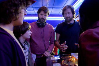 The Duffer brothers direct the young actors of Stranger Things. (Jackson Lee Davis/Netflix)