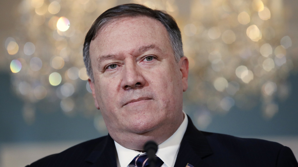 Secretary of State Mike Pompeo speaks about the new limit on refugees to the media Monday at the State Department in Washington.