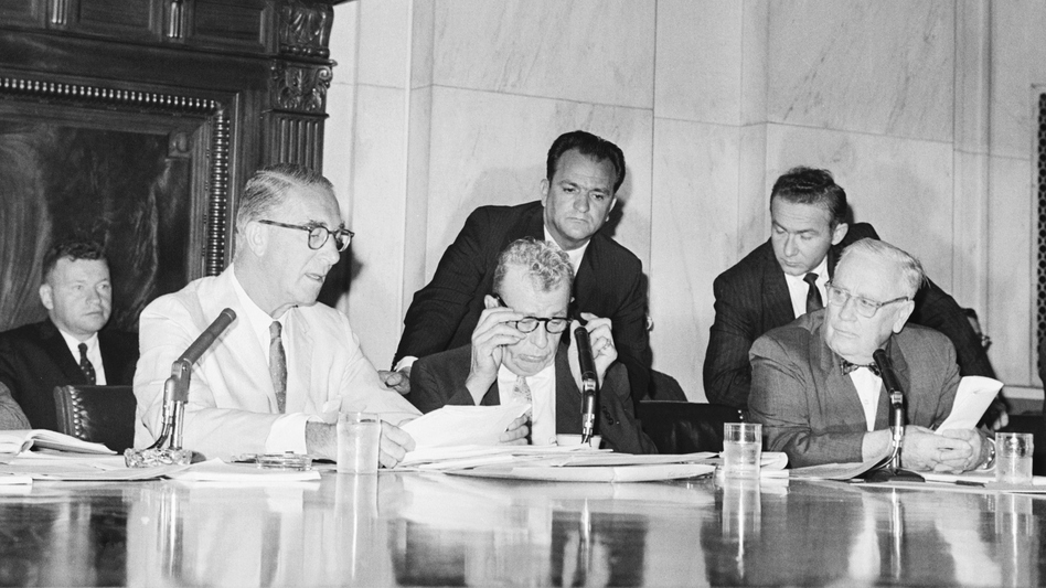 Sen. Estes Kefauver, D-Tenn., (left) and Sen. Everett Dirksen, R-Ill., (second from left) clashed at the reopening of a Senate drug investigation in 1960 over whether witnesses could be forced to reveal business secrets while testifying.