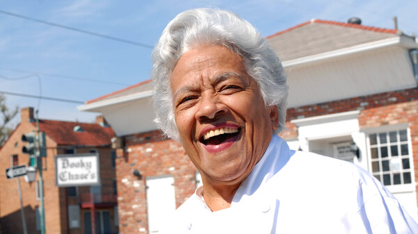 Chef Leah Chase stands outside her famous Creole restaurant, Dooky Chase