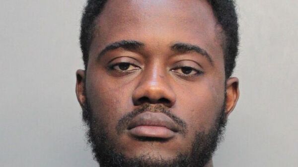 Miami-Dade police arrested Carlints St. Louis on Tuesday. Authorities say he committed a July shooting that wounded a 68-year-old man as he was walking to a Miami synagogue.