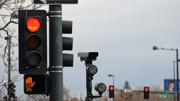 This red light camera is at the intersection of 6th Avenue, Speer Boulevard and Lincoln Street in Denver. A new study finds that deaths caused by motorists running red lights have risen to a 10-year-high.