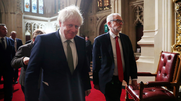 Prime Minister Boris Johnson (left) and Labour Party leader Jeremy Corbyn arrive for the opening of Parliament on Dec. 19 in London. Corbyn