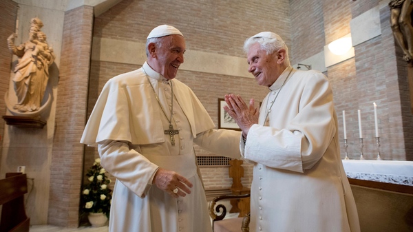 Pope Francis (left) talks with Pope Emeritus Benedict XVI in the former Convent Mater Ecclesiae at the Vatican in 2016, three years after Benedict stunned the Catholic Church by resigning to become pope emeritus.