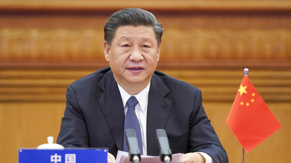In this photo released by Xinhua News Agency, Chinese President Xi Jinping attends the G-20 Extraordinary Virtual Leaders