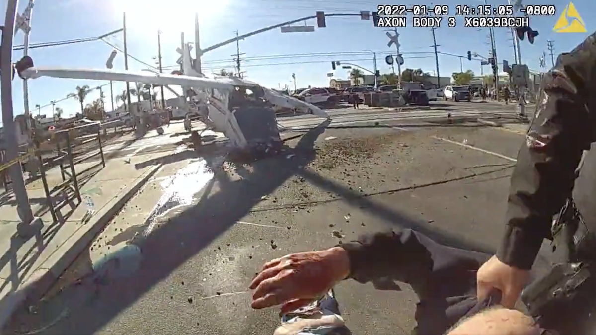 A plane crashed, then was smashed by a train. Its pilot was rescued just in time 2 A plane crashed, then was smashed by a train. Its pilot was rescued just in time