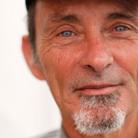 See portraits of uninsured Americans who attended a free medical camp.