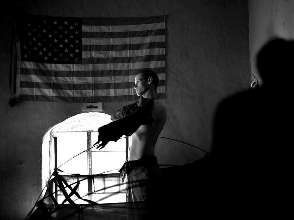 Marine of Golf Company prepares for patrol in Helmand Valley