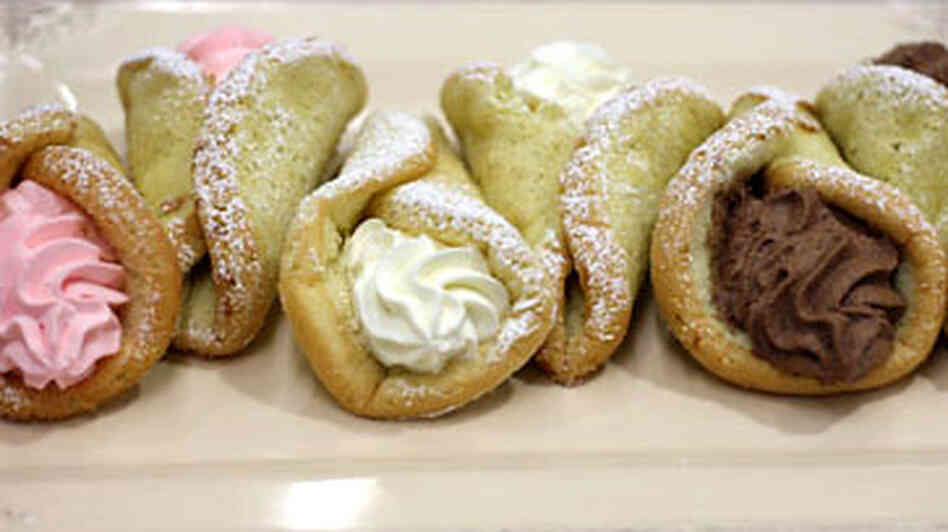 Rolled up cornucopia sponge-cake dessert Rolled up cornucopia sponge-cake dessert