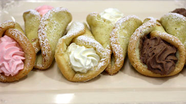 Rolled up cornucopia sponge-cake dessert