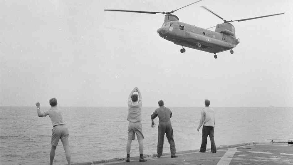 Kirk crew members wave off a CH-47 Chinook, dissuading Ba Nguyen from landing.