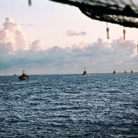 The South Vietnamese fleet follows the USS Kirk to Subic Bay in the Philippines.