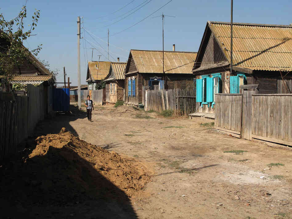 In Zelenga, the roads are unpaved and residents get water only a few hours a day