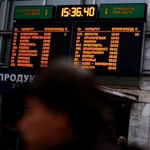 The schedule board at Yaroslavsky station lists the departure times and platform numbers of trains outbound from Moscow. (David Gilkey/NPR)