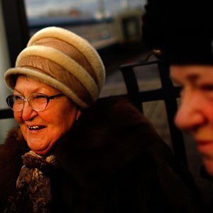 Tamara Ostrovskaya (left) and her sister-in-law, Albina Ostrovskaya, stand on the platform at Yaroslavsky station. Tamara is embarking on a three-day trip to Krasnoyarsk, in central Siberia. (David Gilkey/NPR)