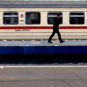 Passengers walk along the platform at Yaroslavsky terminal, the jumping-off point for most Trans-Siberian journeys and one of Moscow's nine train stations. (David Gilkey/NPR)