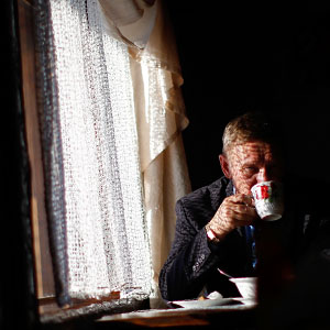 A man sips his tea in a roadside cafe on the highway between the city of Ulan-Ude and Lake Baikal. (David Gilkey/NPR)