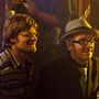 Steve Zahn as Davis McAlary, with Elvis Costello