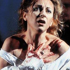 Soprano Natalie Dessay -- with the blood to prove it -- as the unhinged Lucia di Lammermoor. Soprano Natalie Dessay -- with the blood to prove it -- as the unhinged Lucia di Lammermoor.