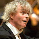 Simon Rattle on the podium. Simon Rattle on the podium.