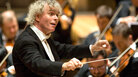 Simon Rattle on the podium. Simon Rattle on the podium.