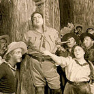 Enrico Caruso (center) stars in Puccini's "La Fanciulla del West"
