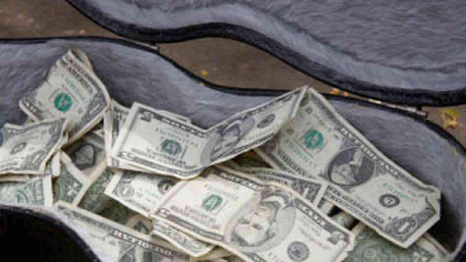 Guitar case and cash Guitar case and cash
