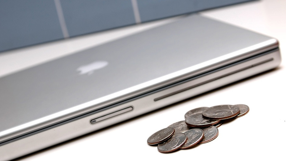 Laptop and coins