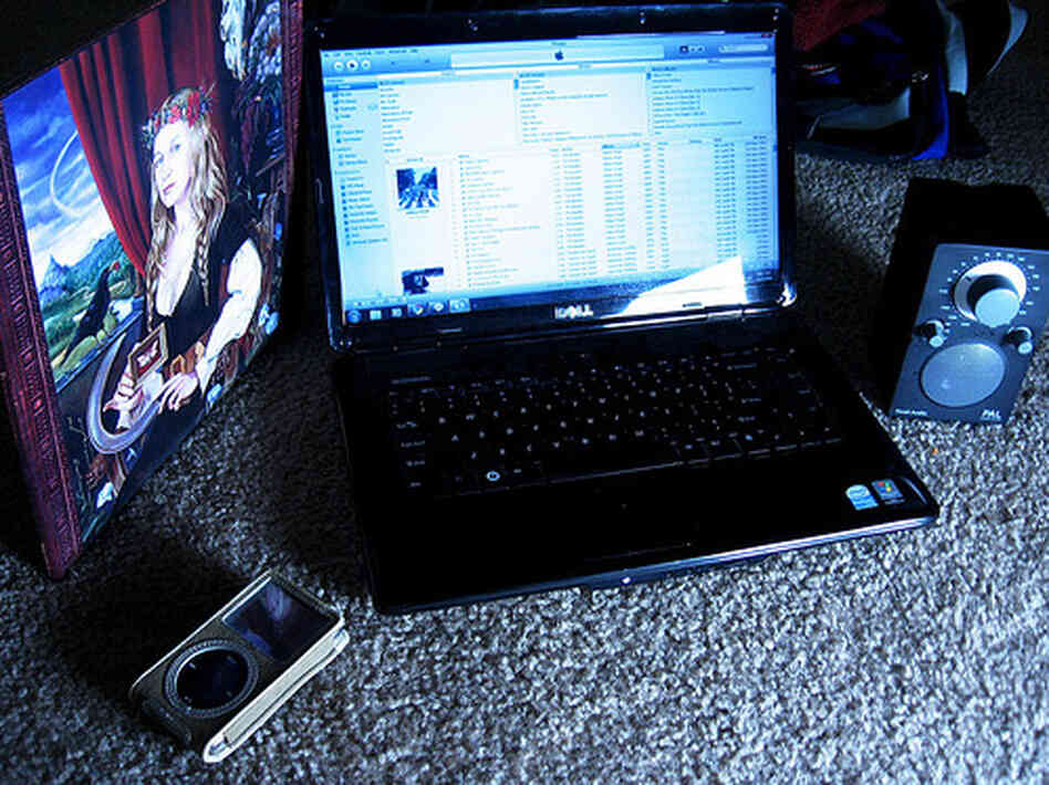 Laptop and coins Laptop and coins