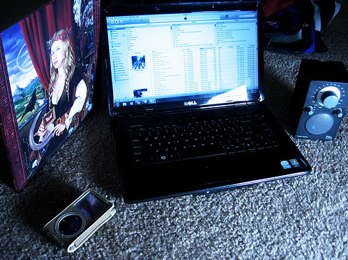 Laptop and coins