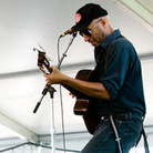 Tom Morello performs at Newport Folk. Tom Morello performs at Newport Folk.