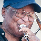 Curtis Fuller of the Cedar Walton All-Stars performs at Newport Jazz. Curtis Fuller of the Cedar Walton All-Stars performs at Newport Jazz.