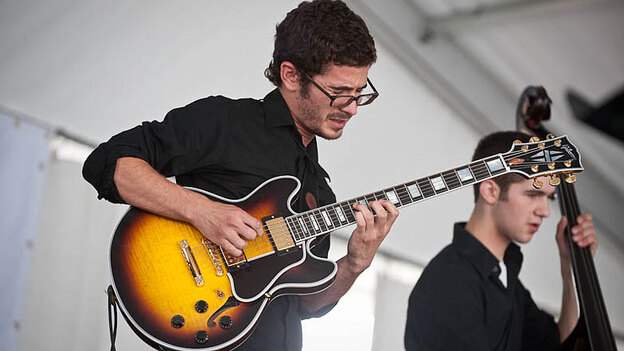 Roy Guzman performs at Newport Jazz.