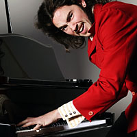 A man annihilates the ivories.