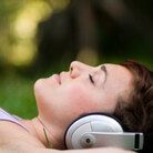 woman in headphones at night woman in headphones at night