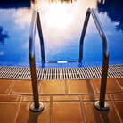 the steps leading into a pool the steps leading into a pool