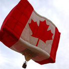 A Canadian flag hot air balloon. A Canadian flag hot air balloon.