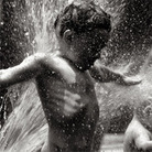 Kid plays in front of a fire hydrant; credit: vcferry via Flickr Kid plays in front of a fire hydrant; credit: vcferry via Flickr