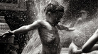Kid plays in front of a fire hydrant; credit: vcferry via Flickr Kid plays in front of a fire hydrant; credit: vcferry via Flickr