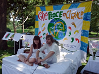 Cameron Miller and Julia West take a turn at the Bed-In in Central Park, sponsored by the World March for Peace and Nonviolence.