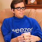 Rivers Cuomo cozies up to a hot cup of Chamomile tea in his blue Weezer Snuggie.