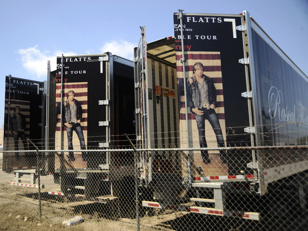 Flooded Rascal Flatts tour trucks.