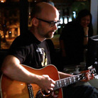 Moby performs at NPR.