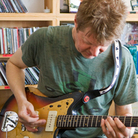 Guitarist Nels Cline performs a Tiny Desk Concert at the NPR Music offices. Guitarist Nels Cline performs a Tiny Desk Concert at the NPR Music offices.